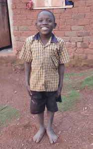 Image of John Mugole smiling