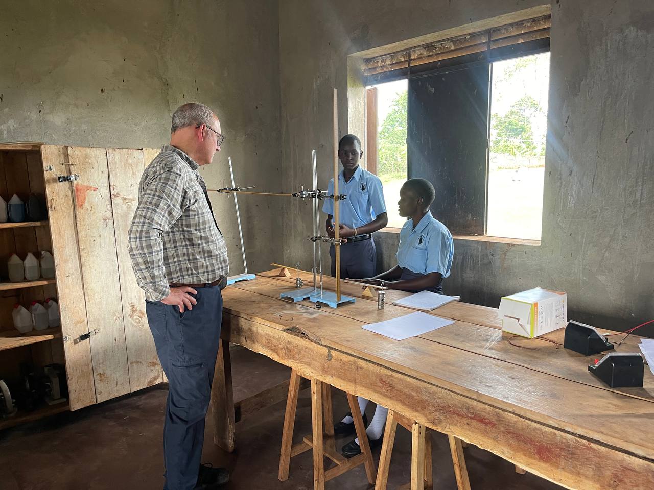 Volunteers teaching and engaging with learners